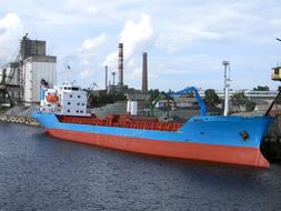 large colored ship in the port