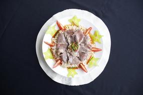 Delicious beef with vegetables in a plate