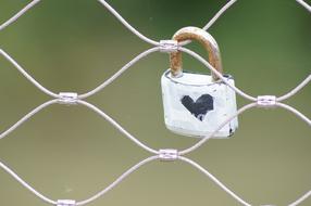 A castle with a heart on the fence