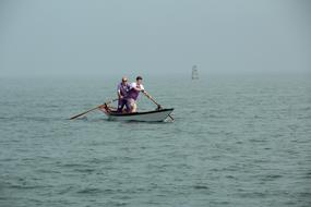 people on a boat seascape