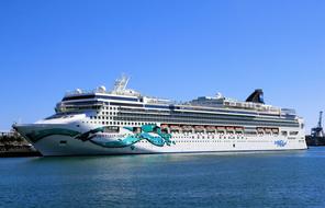 the big ship sails into port