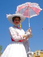 cute girl with a dress and an umbrella