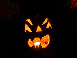 glowing pumpkin with a face