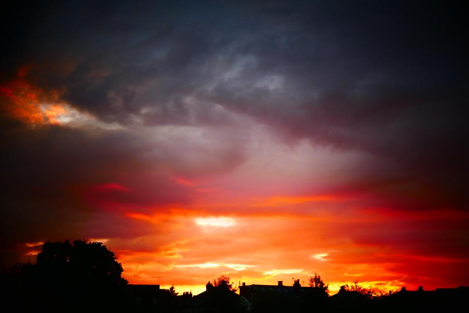 orange sunset on the silhouette of the city