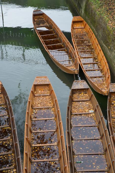 long boats in the water in the river