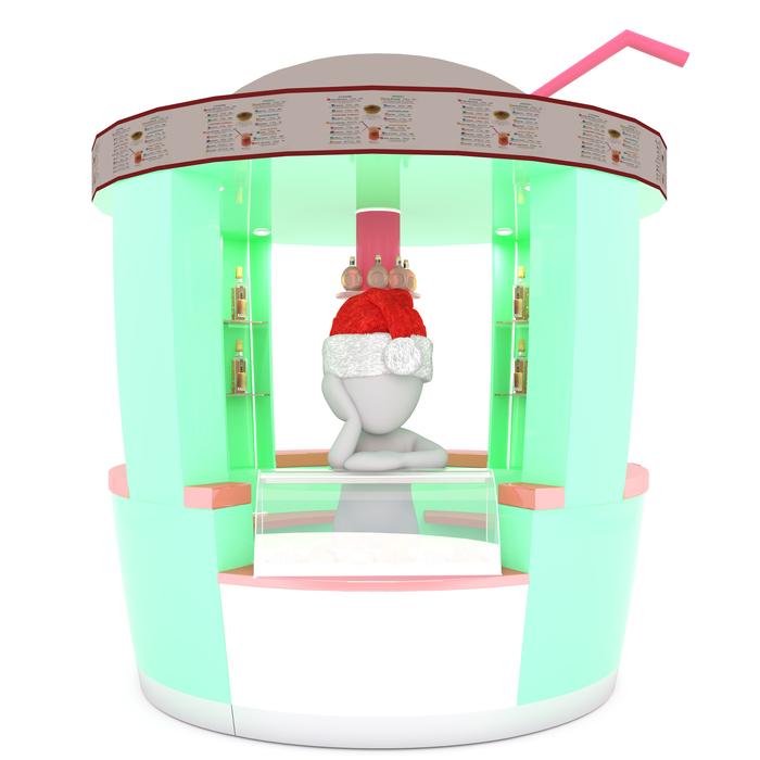 model of a man in christmas hat in a glass building