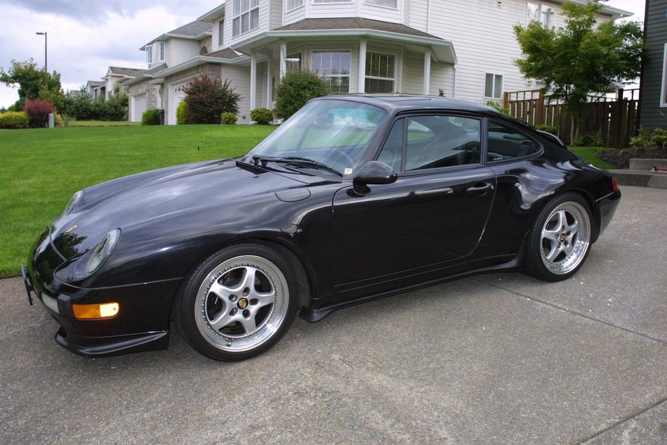 black car in front of the house