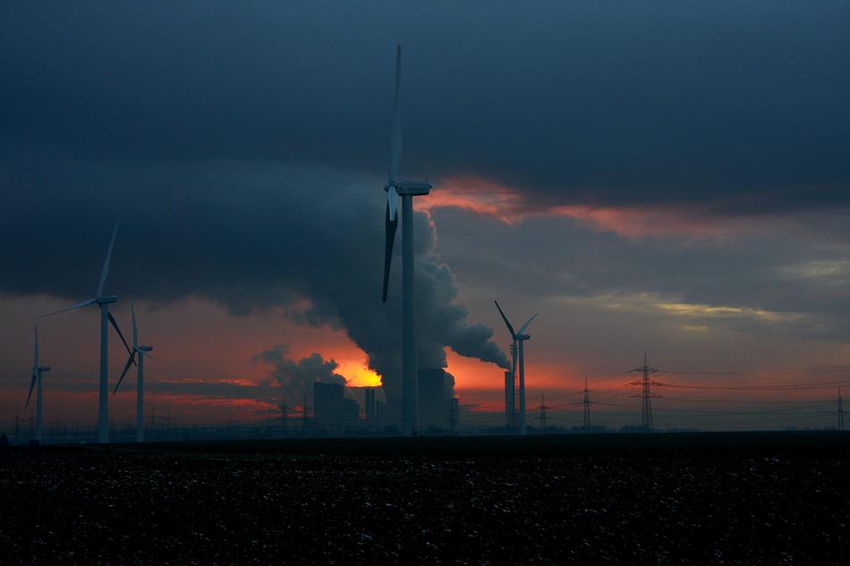 windmills on the field at night
