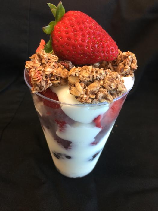 delicious ice cream with jam and strawberries