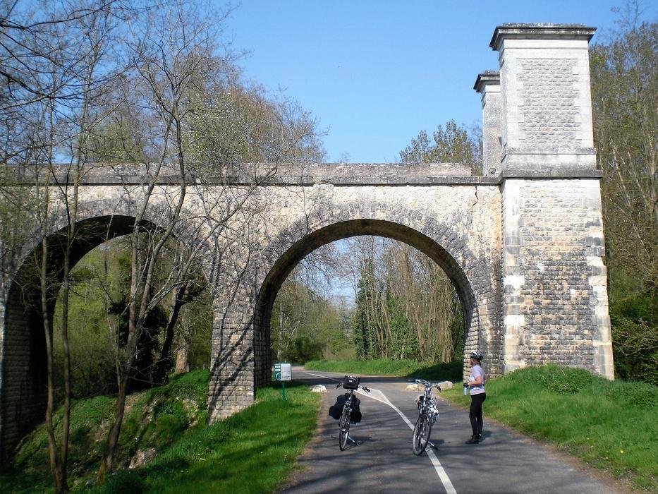arch bridge bridge people road park