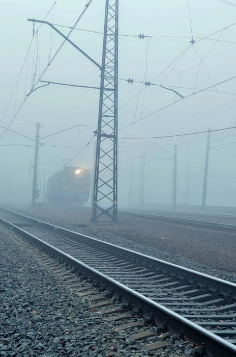 view of the railroad in the fog