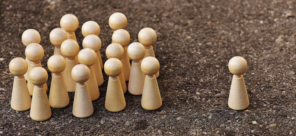 wooden figures on the ground