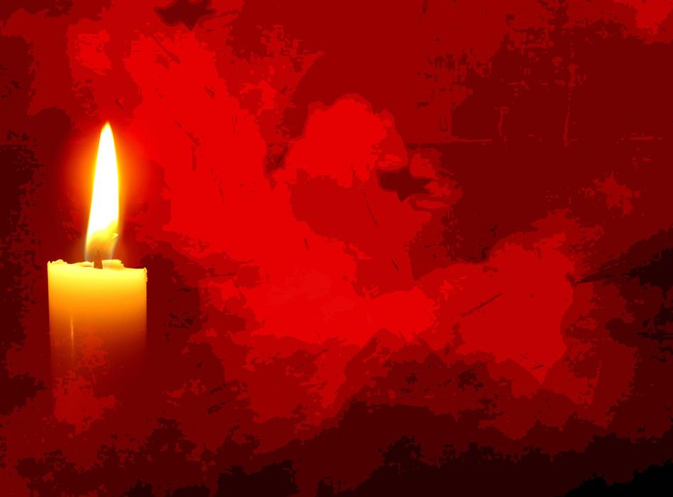 candle on a red background