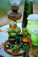 green matryoshka doll on the table decoration