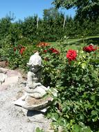 Garden Stone Figure Bed Of