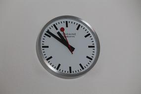 clock with big hands on the wall