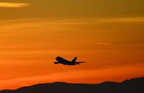 Jetliner Flying Silhouette at sunset
