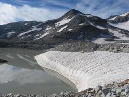 gray mountain in white snow