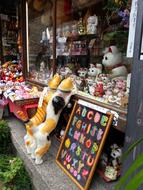 decorative porcelain cats in the store