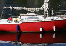 red boat on the water