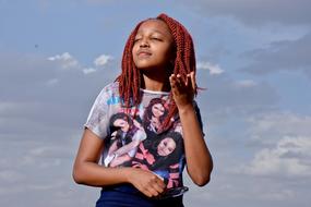 photo of Cute Girl at sky