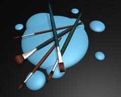 blue paint with brushes on the table