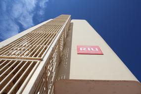 a tall building with the inscription