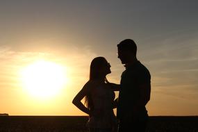 Love Story Silhouette at Sunset