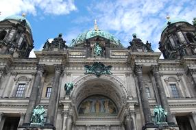 historic house with arches and statues in germany