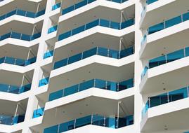 modern white building with glazed balconies as 3d illustration