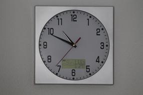wall clock indicating the time