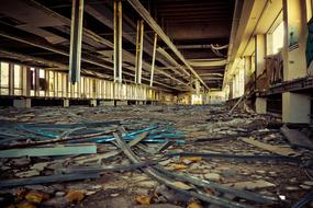 Old, abandoned factory with columns and graffities