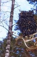 wooden owl in the park