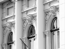 Black and white photo of the facade of the building with columns