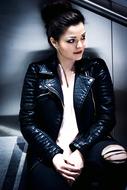 Portrait of the girl with dark make-up, and in black jacket