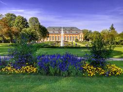 Beautiful building, among the colorful plants in Bessungen, Darmstadt, Hesse, Germany