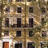 architecture of rome in the shade of trees