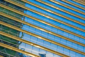 high-rise glass building in Barcelona