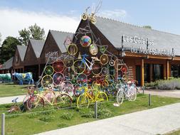 figure made of iron colored bicycles