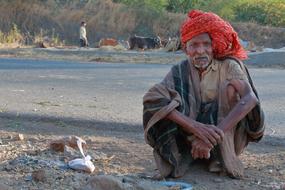 old man in india by the river