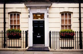 black door of the front facade of the house