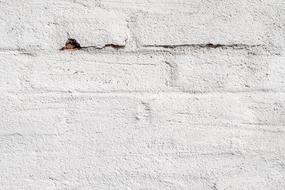 shabby white brick wall