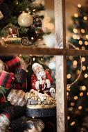Beautiful and colorful Christmas decorations with the figure of Santa Claus and lights