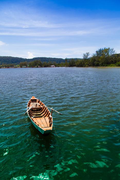 clear beautiful lake with a boat