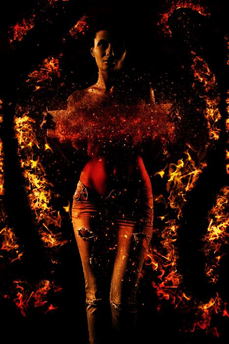 young woman model in fire