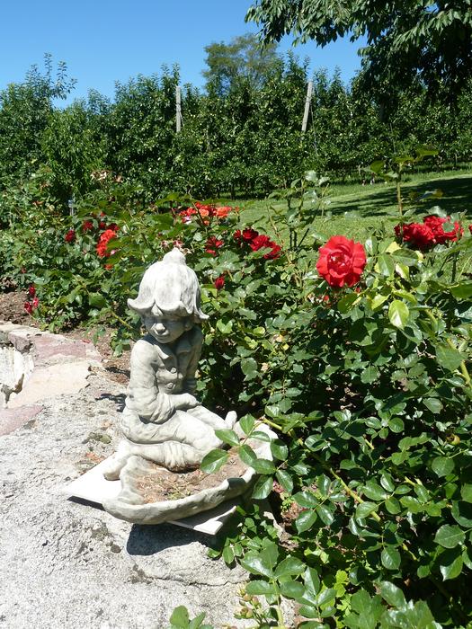 Garden Stone Figure Bed Of