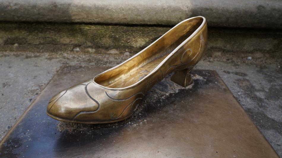 gold shoe sculpture