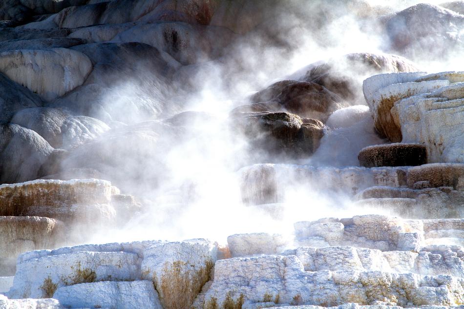 white steam over rocks