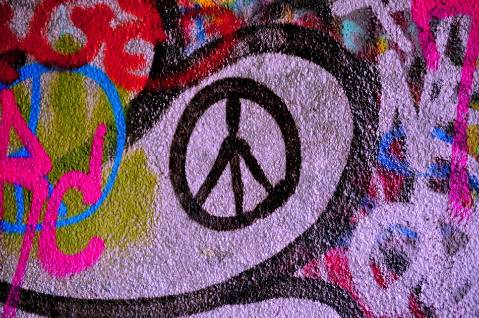 peace sign on colored graffiti