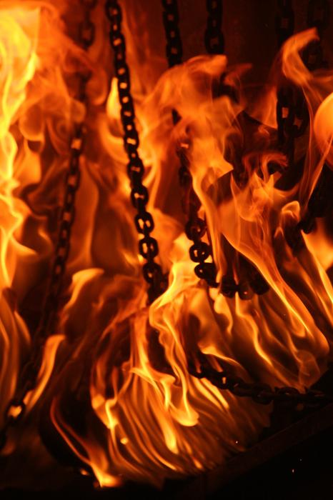 iron chains in a burning fire